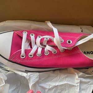 Unisex pink low Chuck Taylors